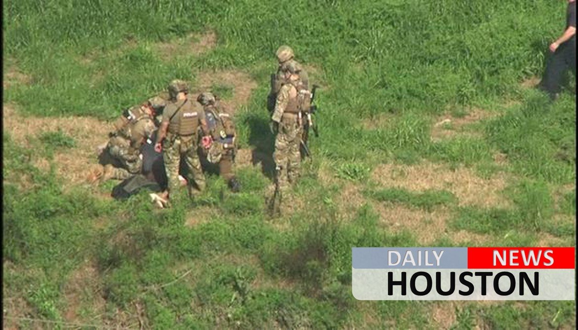 SWAT officers take armed man into custody on Greens Bayou