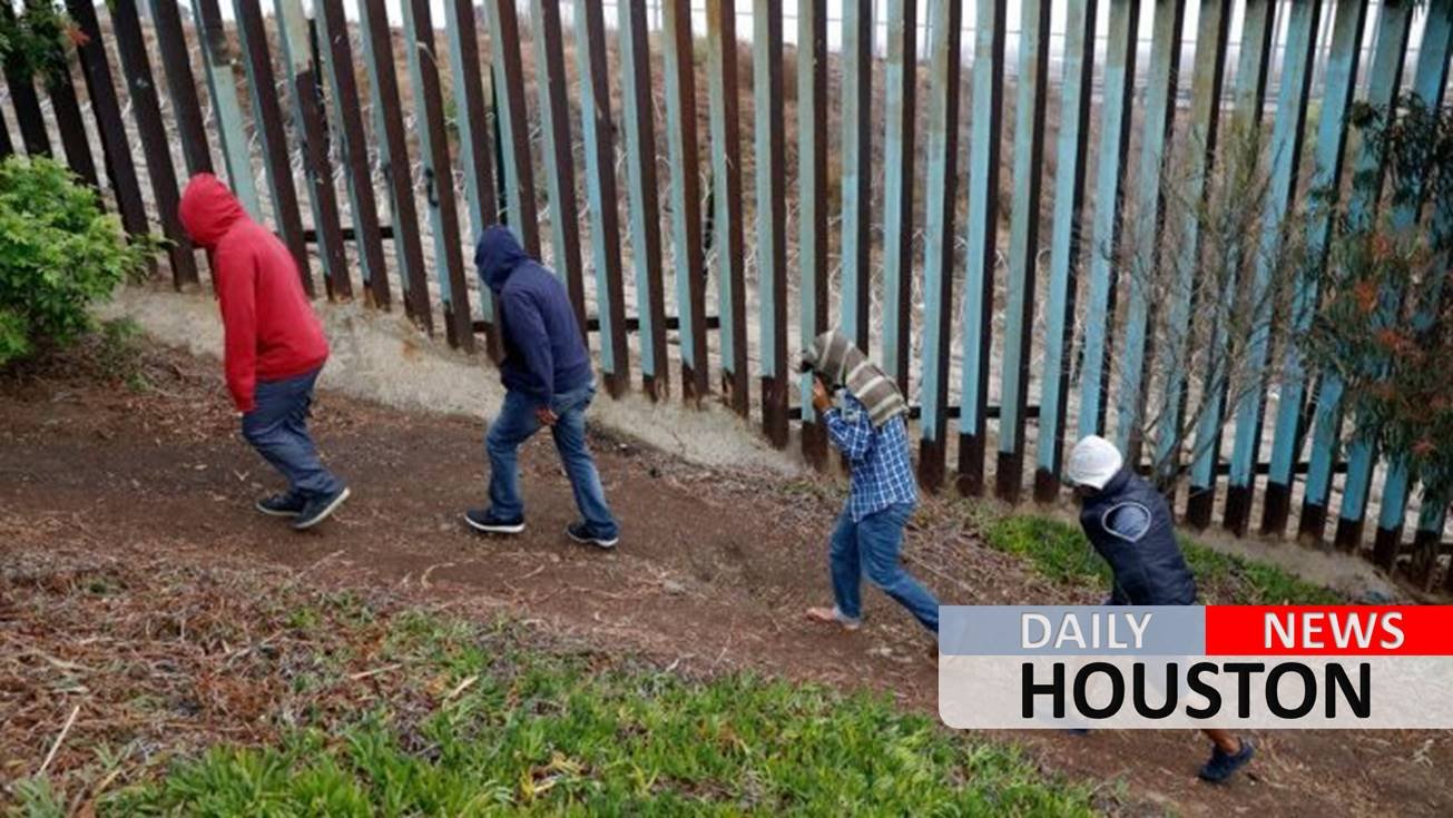 Honduran woman, 19, in migrant caravan scales border wall to give birth in US after 2,000-mile trip