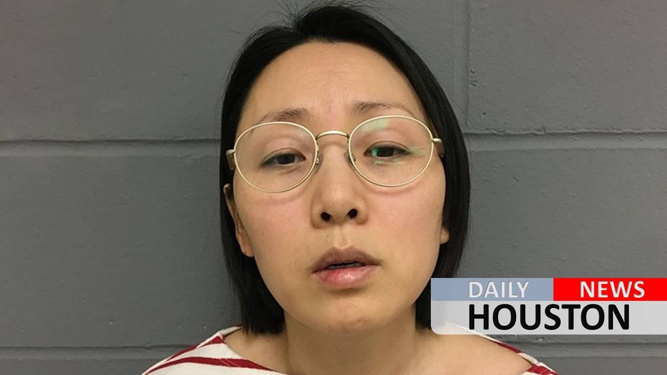 Iowa professor accused of murder in husband’s bizarre death